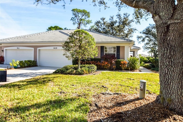 ranch-style house with a garage and a front yard