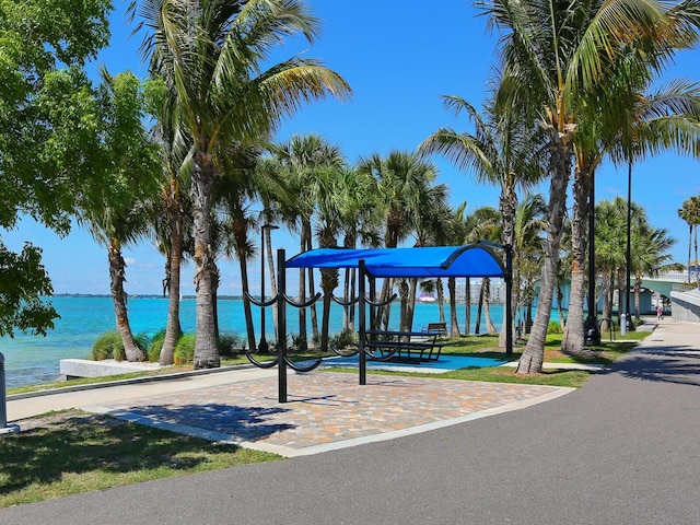 view of play area with a water view