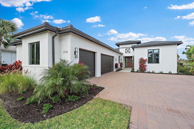 view of front of home with a garage