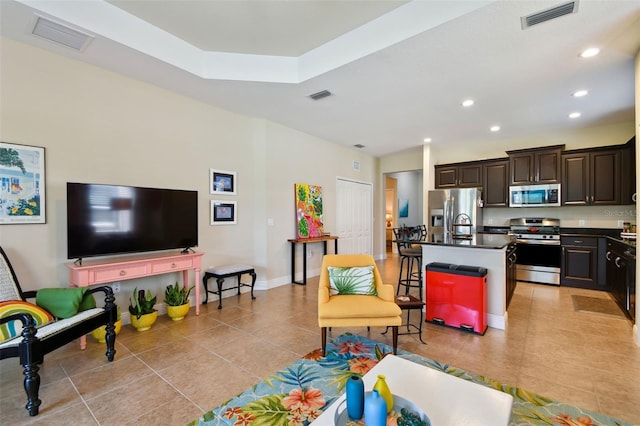 4618 Deep Creek Ter, Parrish, FL 34219 - living room with sink and light tile floors