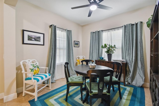 4618 Deep Creek Ter, Parrish, FL 34219 - dining room with light tile floors, ceiling fan, and a wealth of natural light