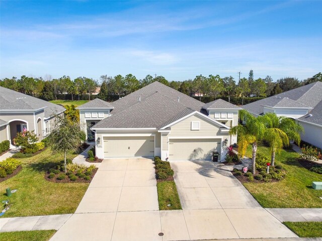 4618 Deep Creek Ter, Parrish, FL 34219 - ranch-style home featuring a front yard and a garage