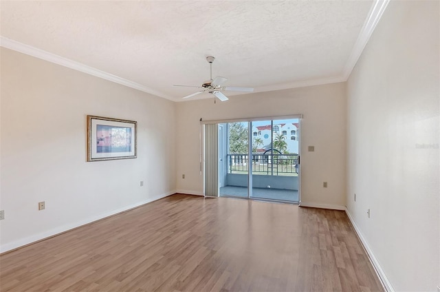 spare room with crown molding, a textured ceiling, wood-type flooring, and ceiling fan