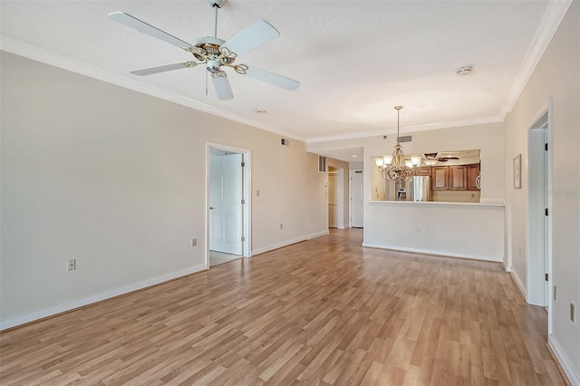 spare room with crown molding, ceiling fan with notable chandelier, and light hardwood / wood-style flooring