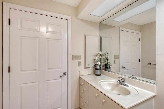 bathroom featuring large vanity