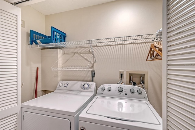 laundry room featuring washer and dryer, washer hookup, and hookup for an electric dryer