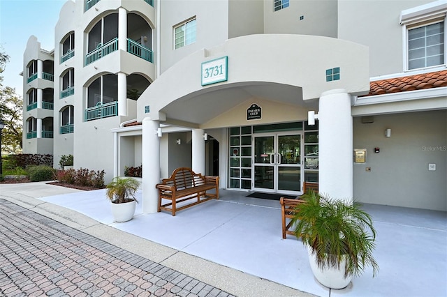 property entrance with a balcony