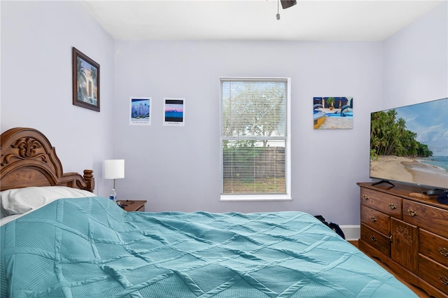 bedroom featuring multiple windows