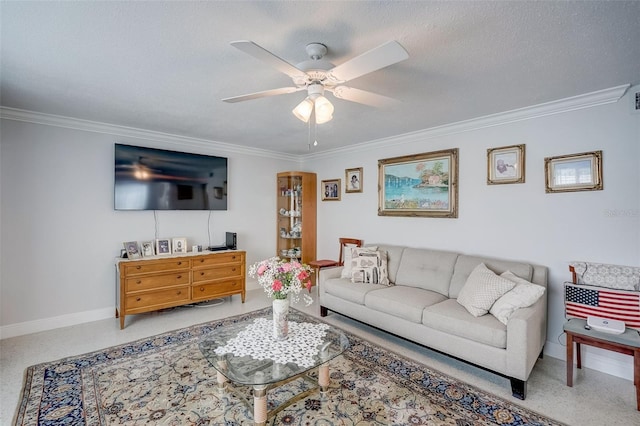 carpeted living room with crown molding, a textured ceiling, baseboards, and ceiling fan