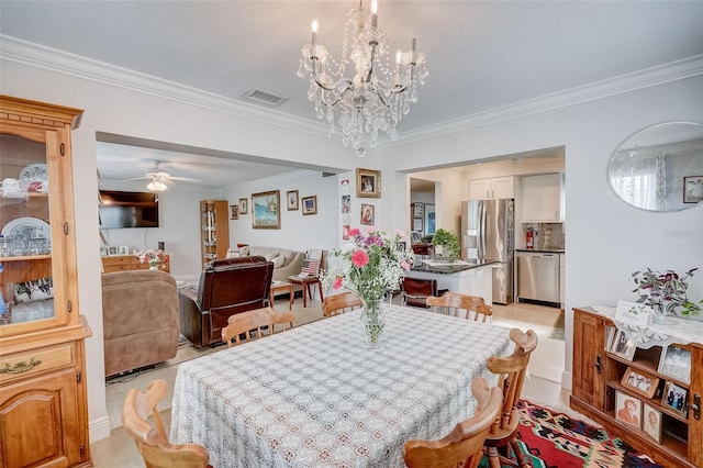 dining area with ceiling fan with notable chandelier, ornamental molding, and visible vents