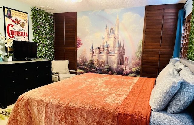 bedroom featuring a textured ceiling