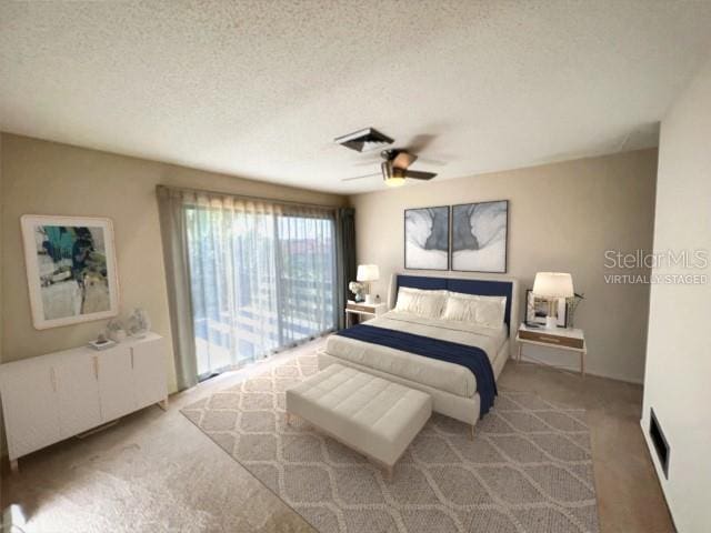 bedroom featuring light carpet, a textured ceiling, ceiling fan, and access to exterior