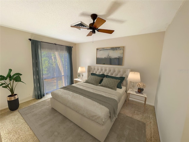 bedroom featuring access to exterior, ceiling fan, and light colored carpet