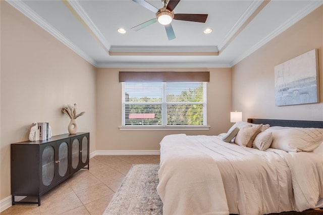 tiled bedroom with a raised ceiling, ceiling fan, and ornamental molding