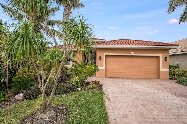 view of front of home with a garage