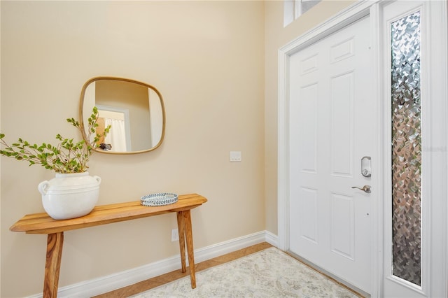 foyer with light tile patterned flooring