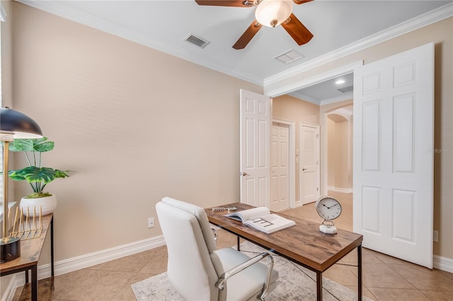 tiled office space featuring ceiling fan and ornamental molding