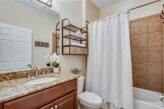 full bathroom with shower / bath combo with shower curtain, vanity, and toilet