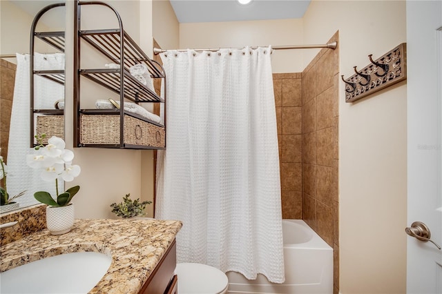 full bathroom featuring vanity, toilet, and shower / bathtub combination with curtain