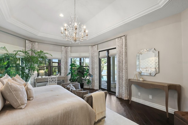 bedroom featuring access to outside, ornamental molding, dark hardwood / wood-style floors, a raised ceiling, and multiple windows