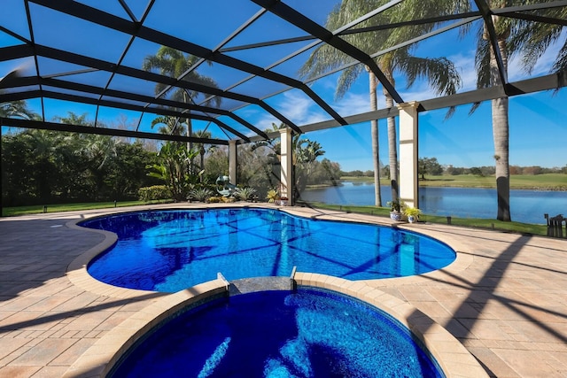 view of pool with a water view, a patio, an in ground hot tub, and glass enclosure