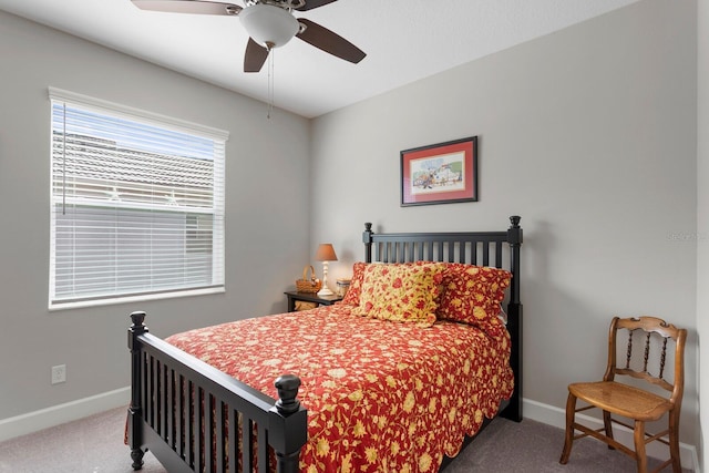 bedroom with ceiling fan and carpet flooring