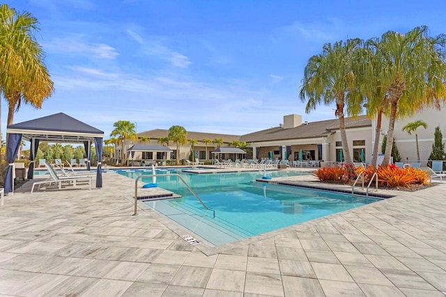 view of swimming pool featuring a gazebo and a patio area