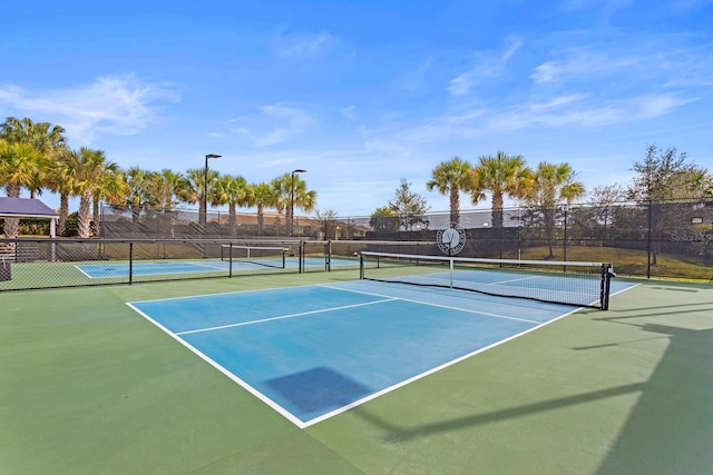 view of tennis court with basketball court