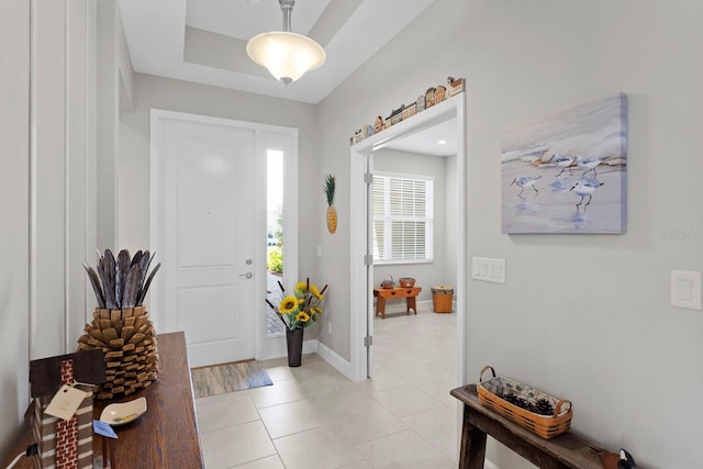 foyer featuring light tile patterned floors