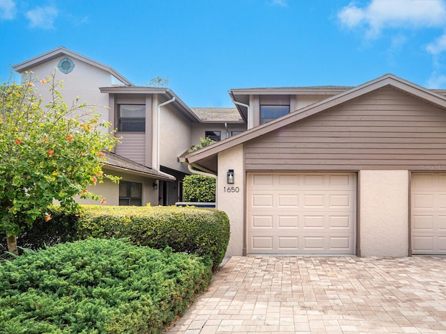 front facade with a garage