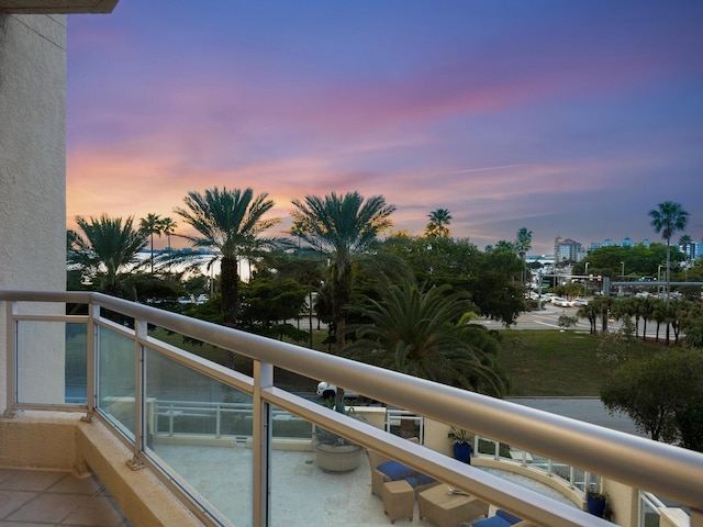 view of balcony at dusk