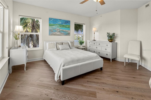 bedroom featuring ceiling fan and hardwood / wood-style flooring