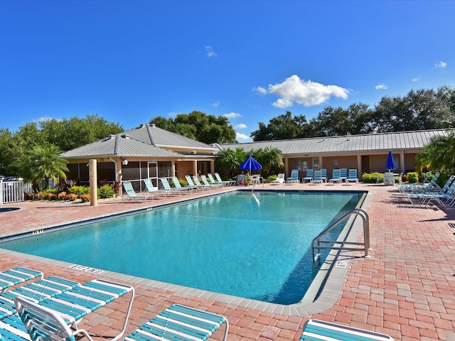 view of pool featuring a patio area