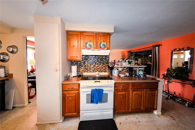 kitchen with electric stove, backsplash, and light carpet