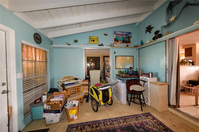 interior space with lofted ceiling with beams