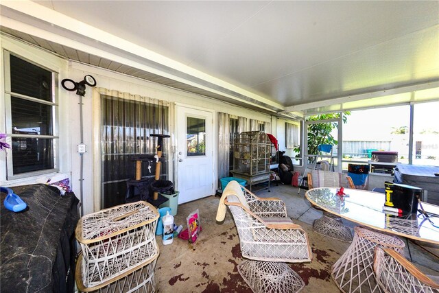 sunroom featuring a wealth of natural light