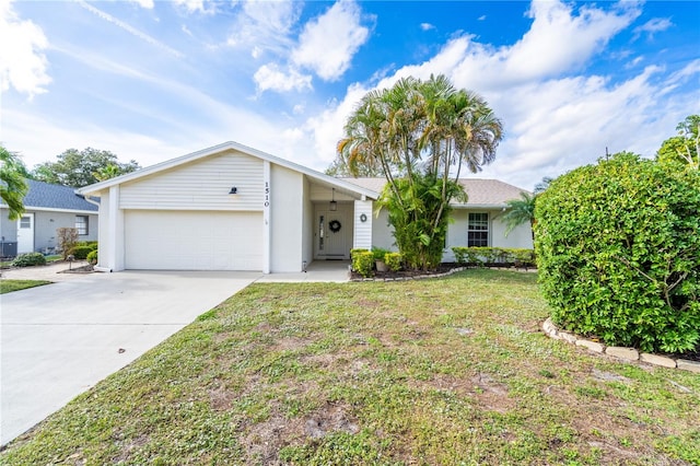 single story home with a front yard and a garage