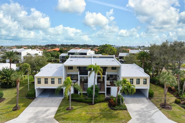 view of front of home featuring a front lawn