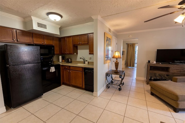 kitchen with sink, ceiling fan, light tile floors, ornamental molding, and black appliances