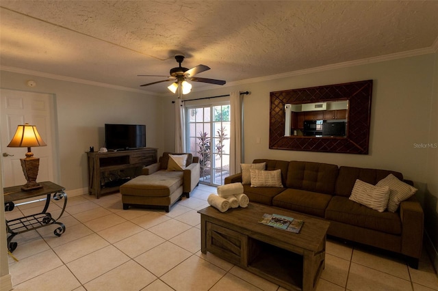 tiled living room with a textured ceiling, crown molding, and ceiling fan