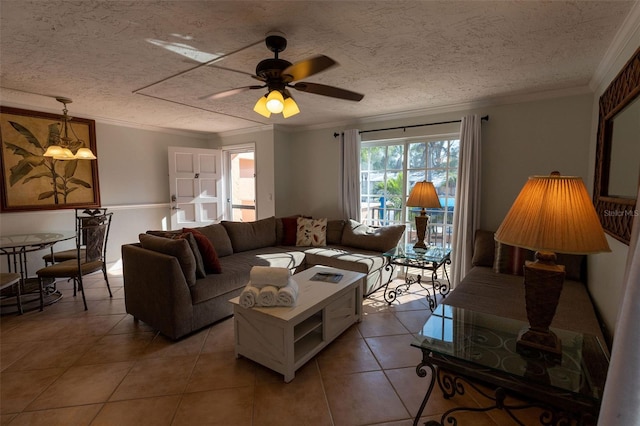 tiled living room featuring ornamental molding, ceiling fan, and a textured ceiling