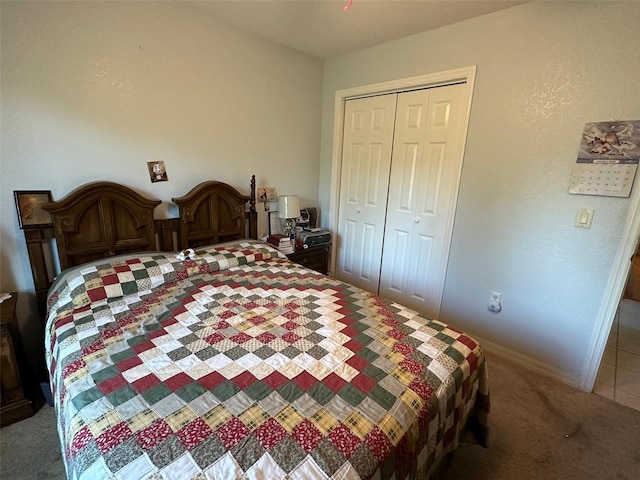 carpeted bedroom featuring a closet