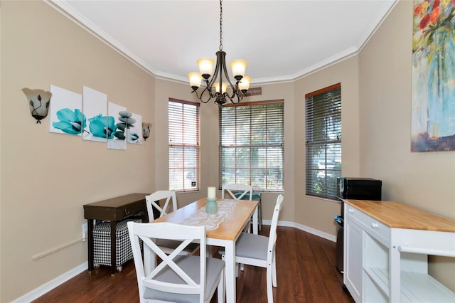 dining room featuring an inviting chandelier, ornamental molding, and dark wood-type flooring