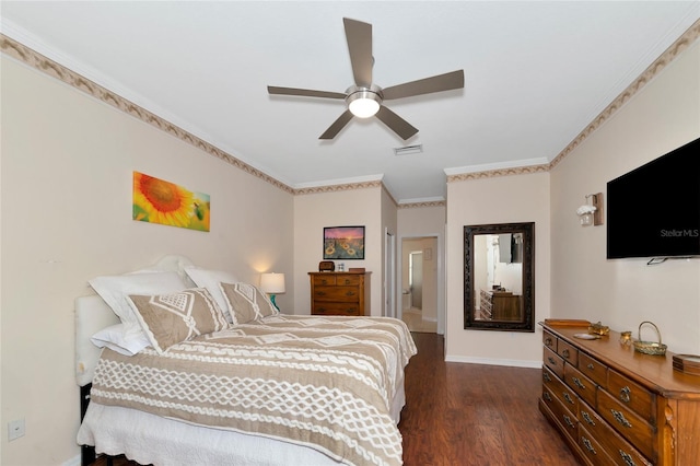 bedroom featuring crown molding, dark hardwood / wood-style floors, and ceiling fan