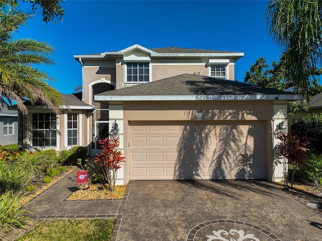 view of front of property with a garage