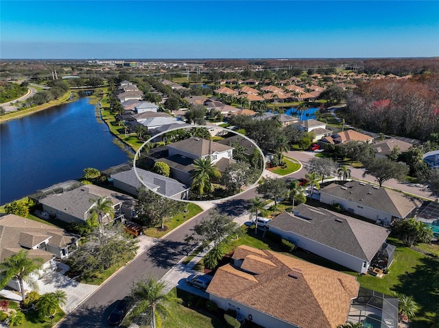 drone / aerial view featuring a water view