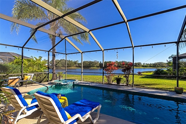 view of pool featuring a yard, a patio area, an in ground hot tub, and a lanai