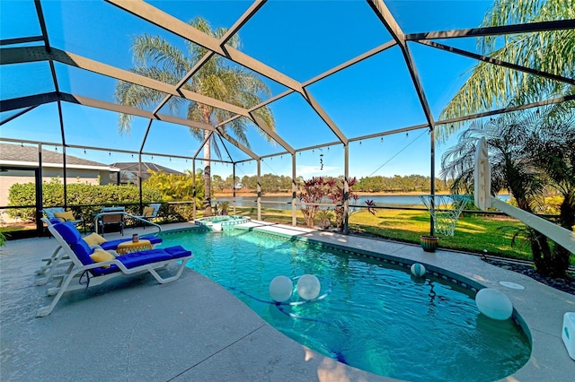 view of swimming pool featuring a lawn, a patio, and a lanai