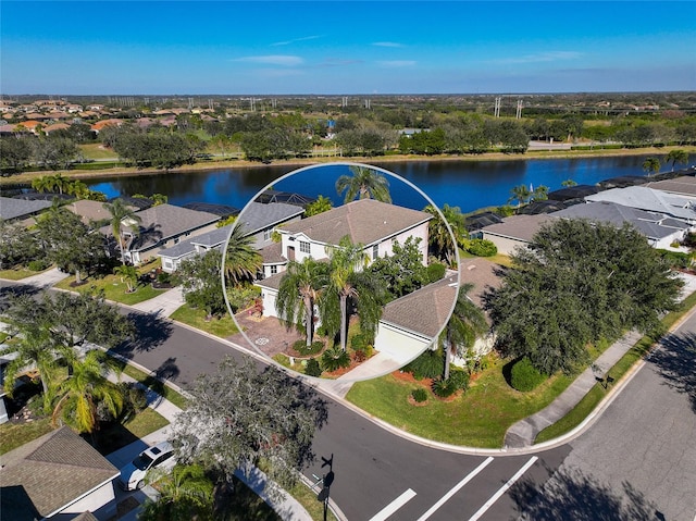 aerial view featuring a water view