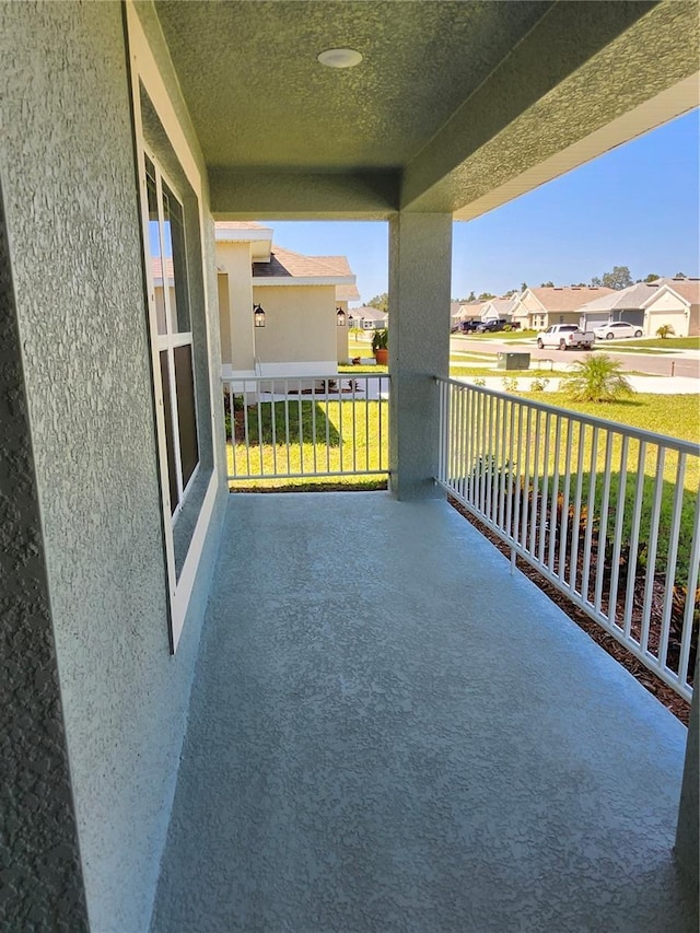 balcony featuring a porch